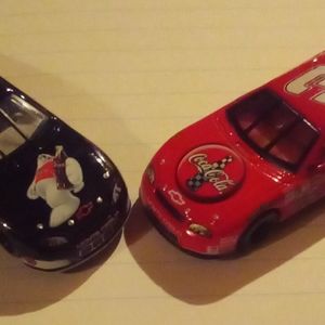 Dale Earhart and Dale Jr coke cars